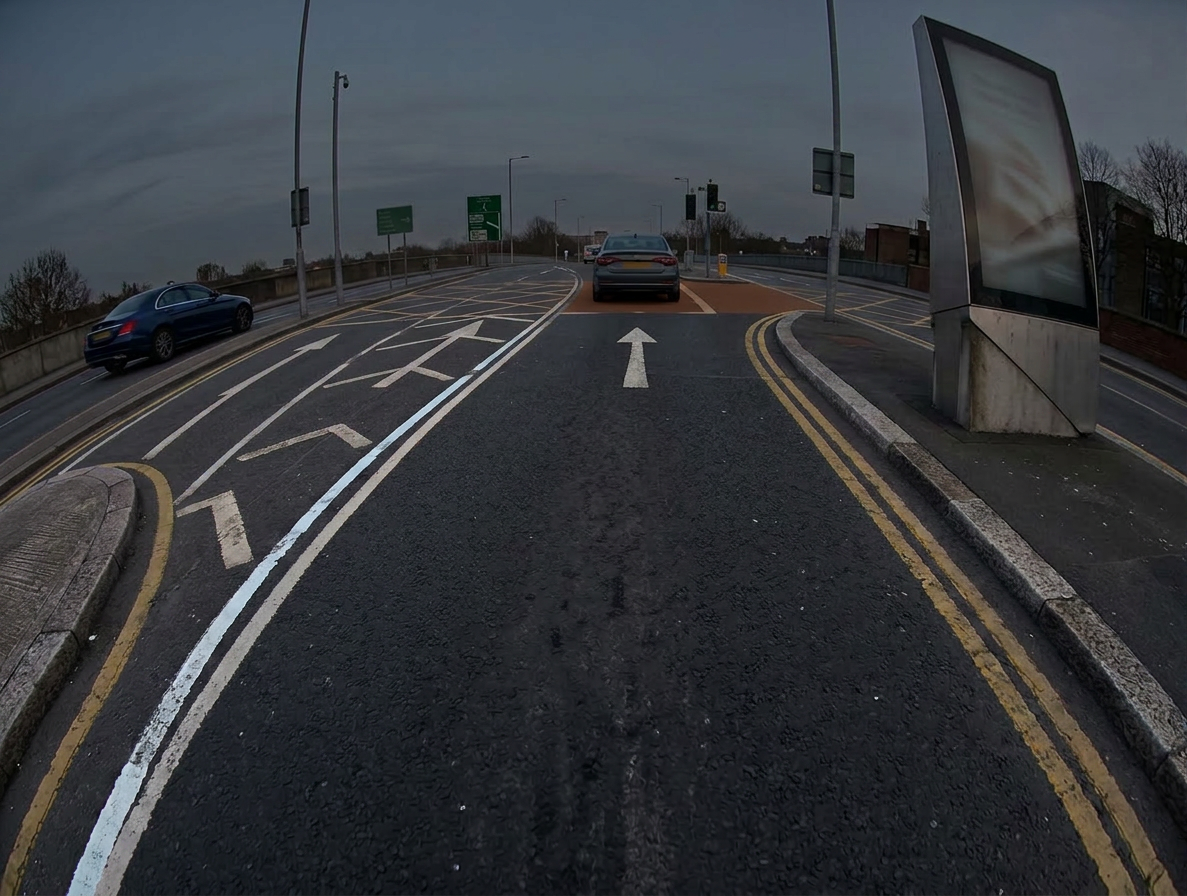 Dusk flyover approach, directional arrows and keep-clear hatching